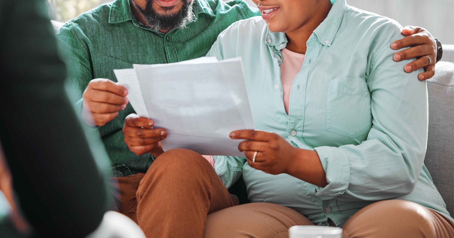 Couple reviewing closing documents